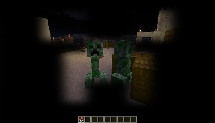 A player is looking at two Creepers through a custom UI overlay in a shape of a Creeper face.