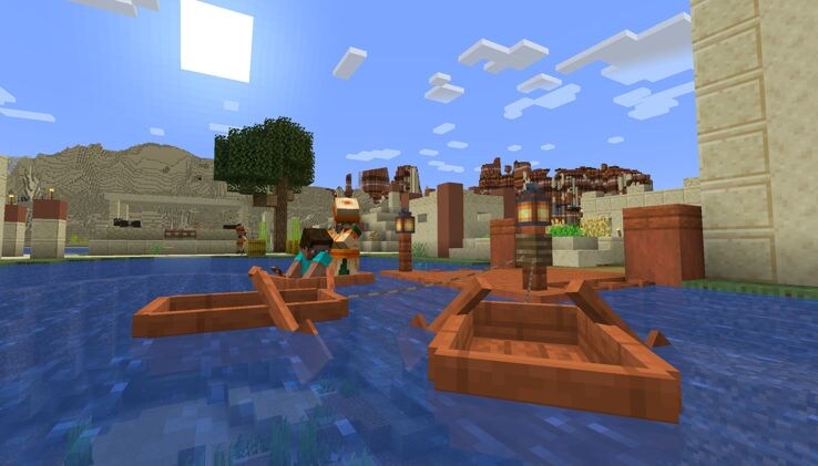 Boats are leashed to a Fence on the dock in a Desert Village. Steve is sitting in a boat together with a Villager.